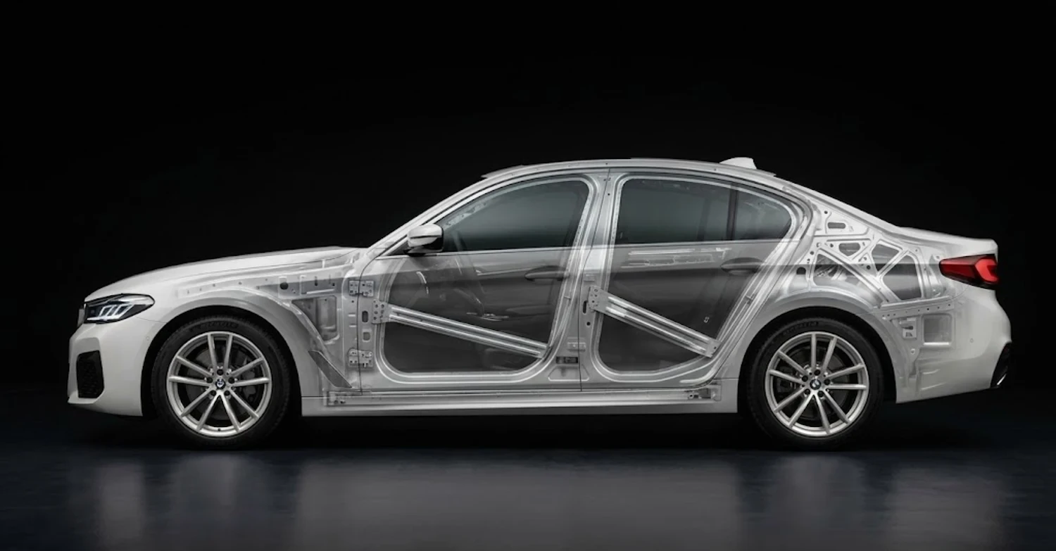 The same BMW with the panels made transparent, showing the door beams and the bracing behind the rear quarter panel