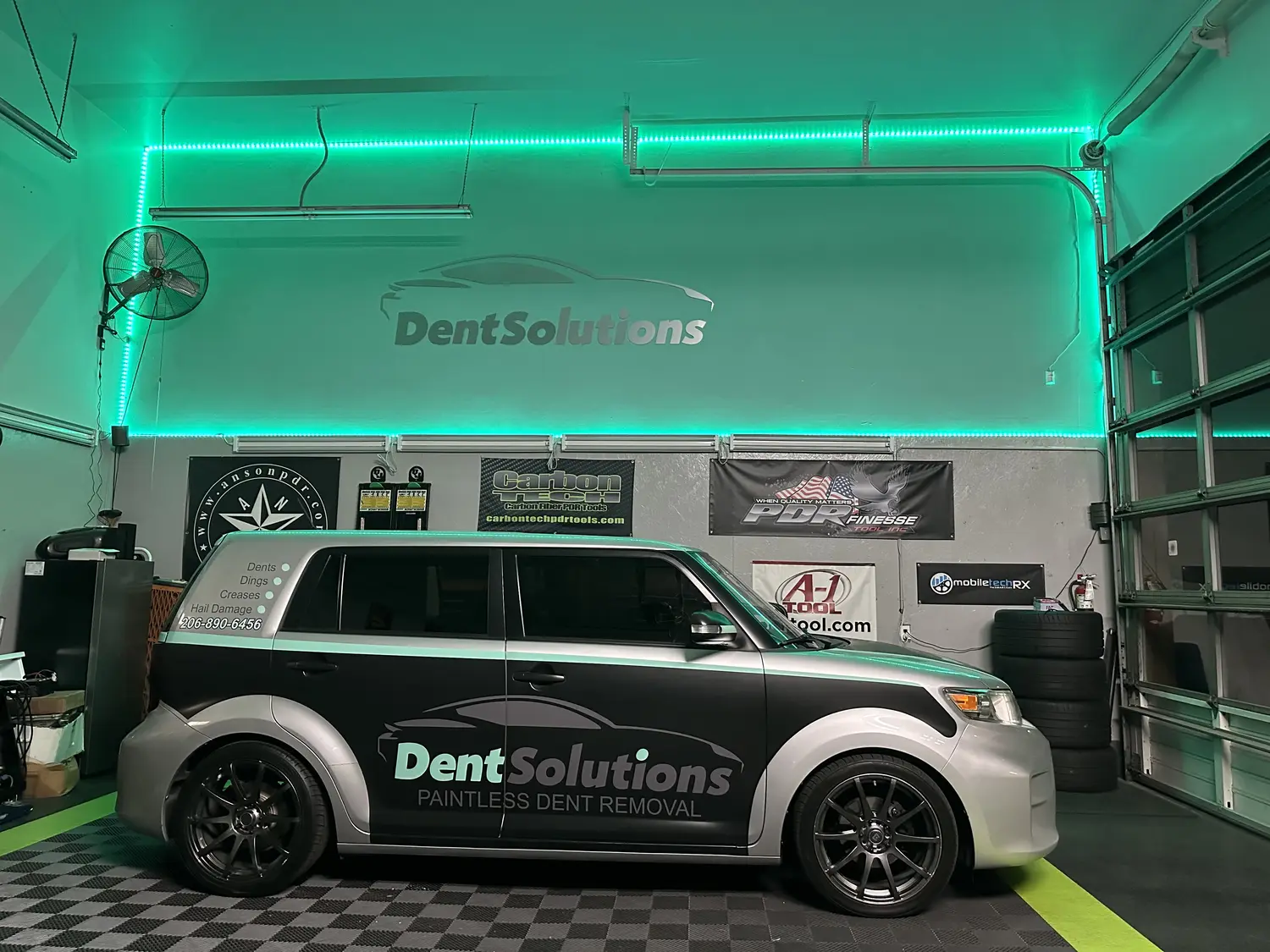 Inside the Dent Solutions NW paintless dent repair shop in Bellevue, WA