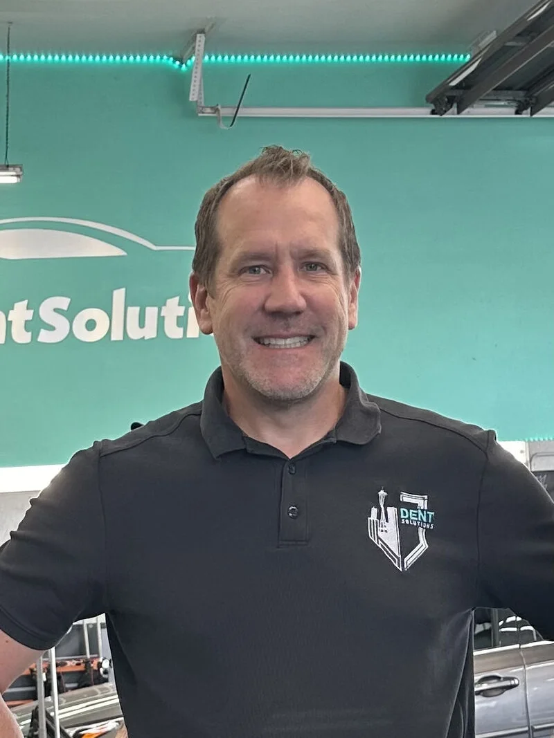 Doug Hillius, owner of Dent Solutions NW, in the Bellevue shop